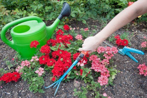 Operator using a jet wash system for cleaning surfaces